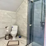 іній *